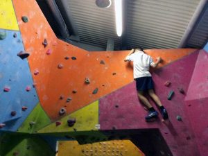 Young Person on Climbing Wall